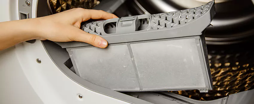 Signs Of A Clogged Dryer Lint Trap in Bay, Massachusetts